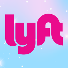 The Lyft logo in bright pink appears against a pastel rainbow background with sparkling stars.