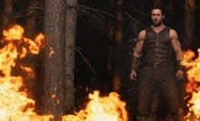 Aaron Taylor Johnson stands in fire in "Kraven the Hunter."