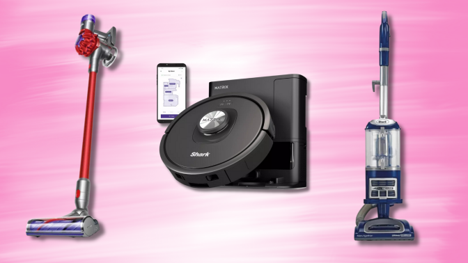 Three vacuum cleaners on a pink background: a red Dyson cordless stick vacuum, a black Shark robot vacuum with self-empty base, and a blue Shark Navigator Lift-Away upright vacuum.