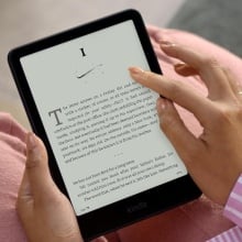 Person using Amazon Kindle tablet