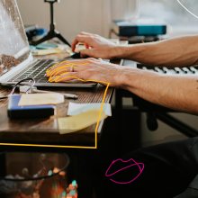 A person's hands typing on a laptop.