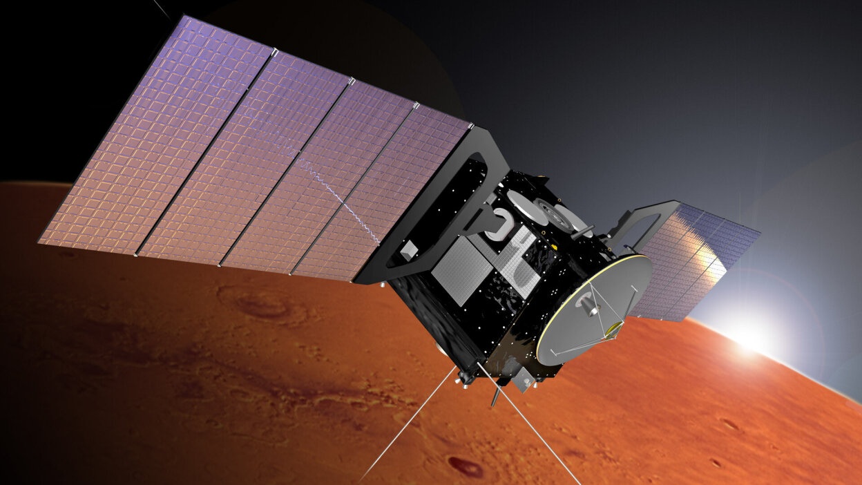 An illustration of the European Space Agency's Mars Express orbiter flying above Mars.