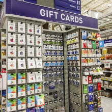 A store displays gift cards for purchase. 