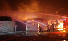 Firefighters continue battling Palisades fire in Los Angeles as flames rage out of control