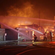 Firefighters continue battling Palisades fire in Los Angeles as flames rage out of control