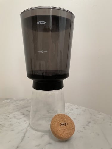 glass carafe with brewing container on top