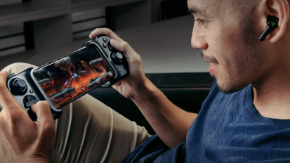 man playing with razer kishi mobile gaming controller