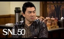 asian man in leather jacket and brown button up shirt