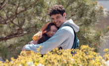 Peter Kavinsky (Noah Centineo) hugging Kitty Song-Covey (Anna Cathcart) in 'XO, Kitty' Season 2.