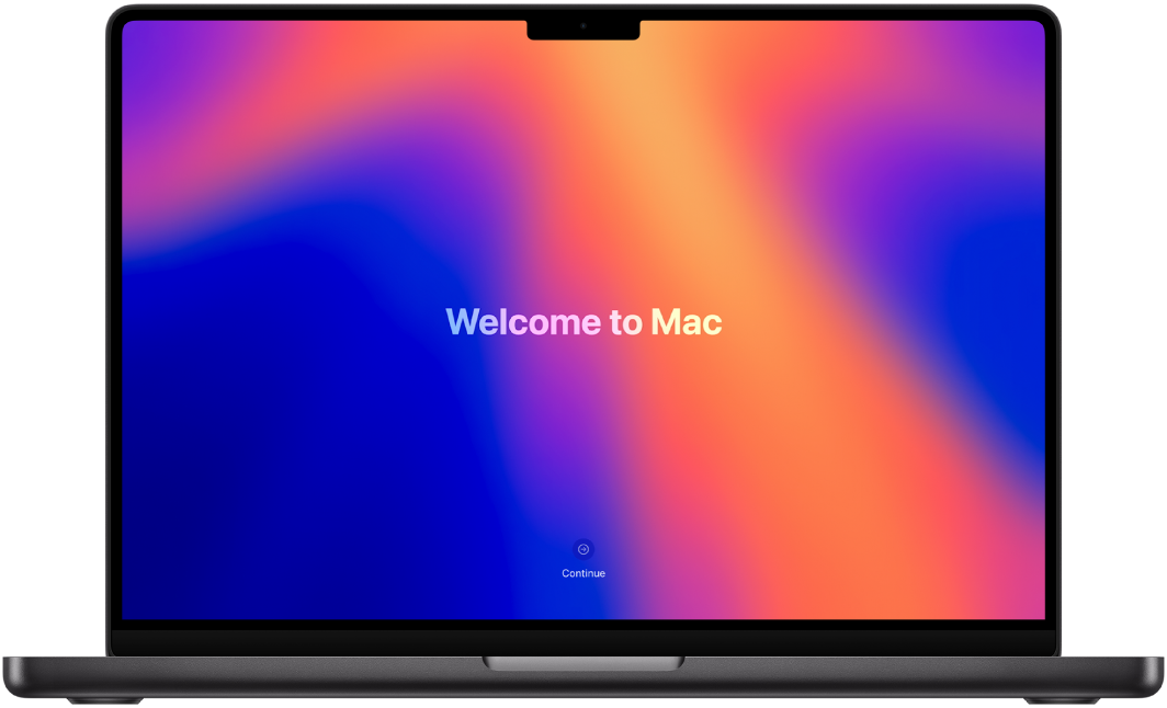 MacBook Pro ouvert avec « Bienvenue sur le Mac » affiché à l’écran.