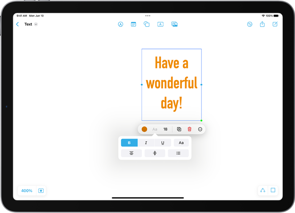 Una pissarra de l’app Freeform mostra un quadre de text seleccionat i, a sobre, les eines de format de text.