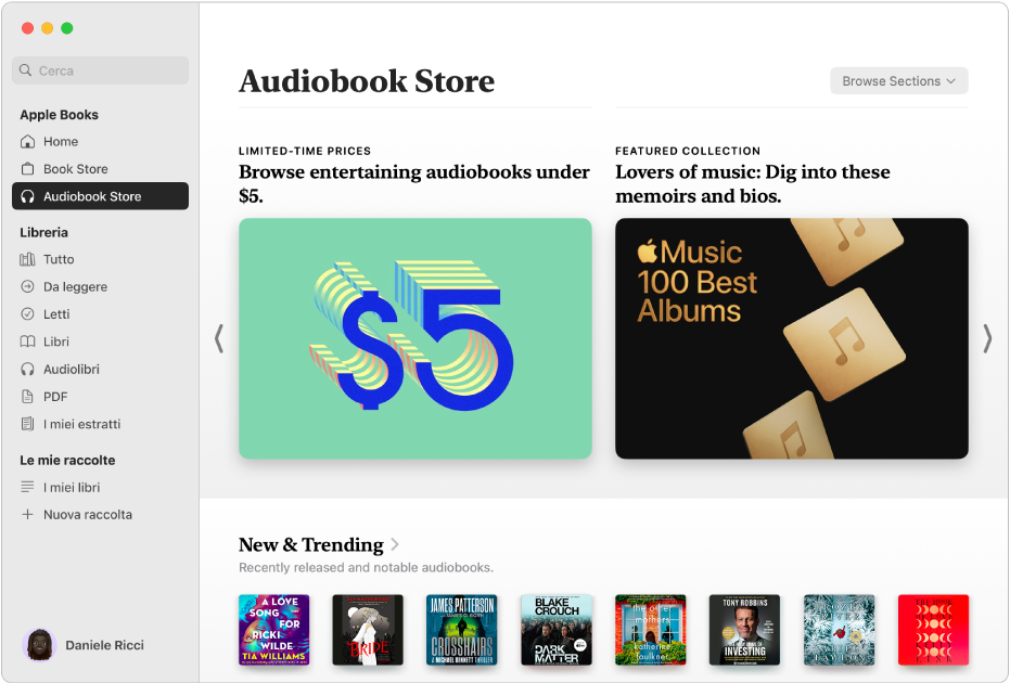 Una finestra dell’app Libri che mostra la sezione Audiobook Store selezionata nella barra laterale, con categorie di titoli sulla destra, tra cui “Nuovi e di tendenza” e gli audiolibri in offerta a tempo limitato.