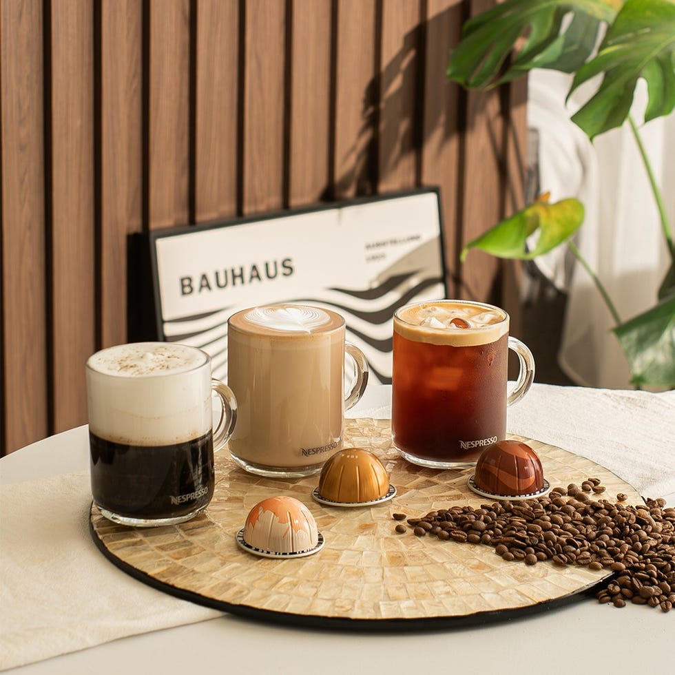 a table with coffee and a book