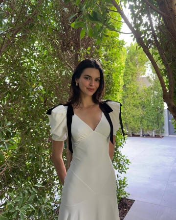 a woman in a white dress