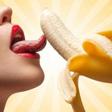 Lip, Skin, Banana, Nose, Banana family, Beauty, Mouth, Yellow, Organ, Close-up, 