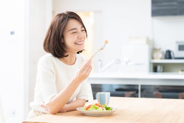 attractive asian woman who eats