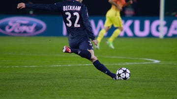 beckham kicking soccer ball