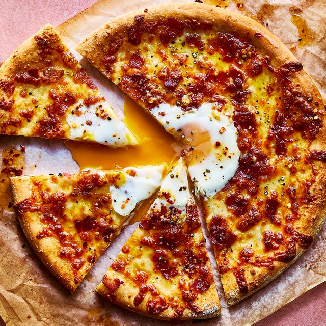 pizza with an egg baked in the middle