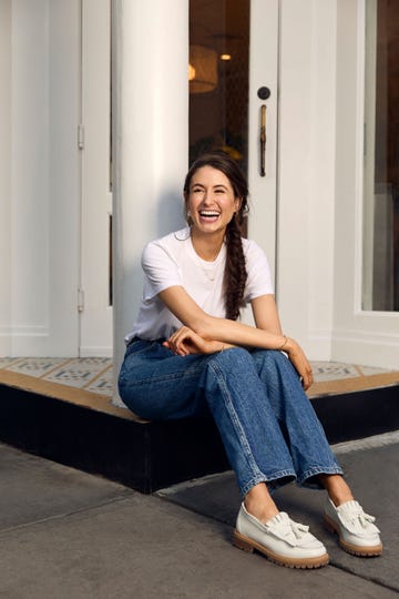 a woman sitting on a step