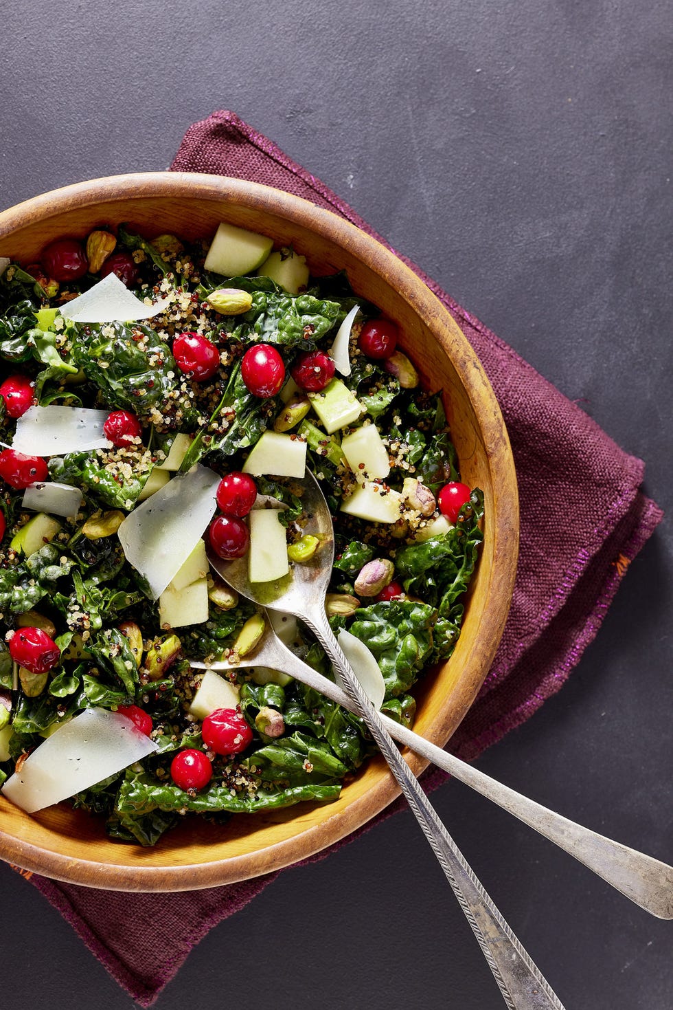 kale salad with pickled cranberries and crispy quinoa