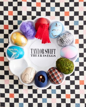 a group of easter eggs decorated for each of taylor swift's albums