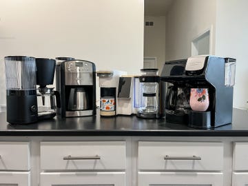 a kitchen counter with coffee makers