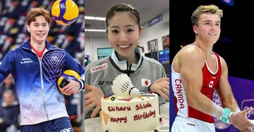 a group of people holding a cake