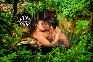 a man and woman in a hot tub in a tropical area