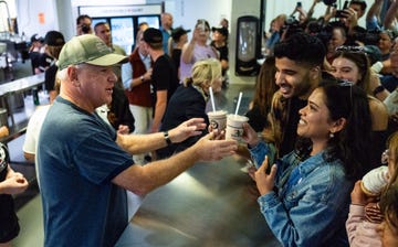 democratic vice presidential nominee mn governor tim walz greets voters at the minnesota state fair