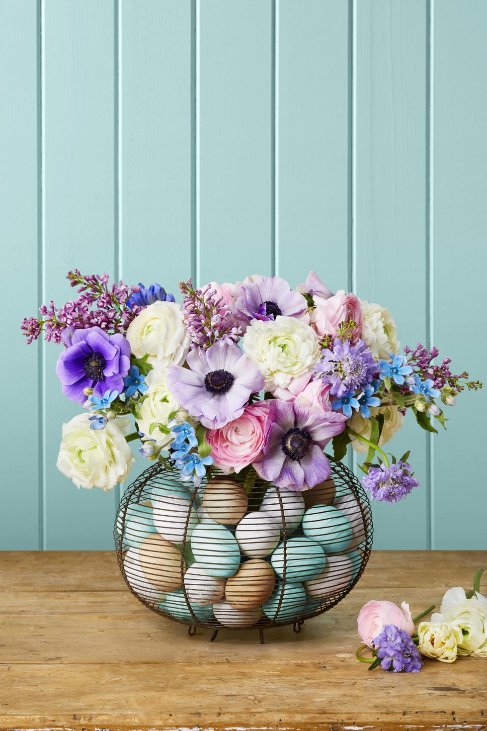 easter egg vases filled with flowers