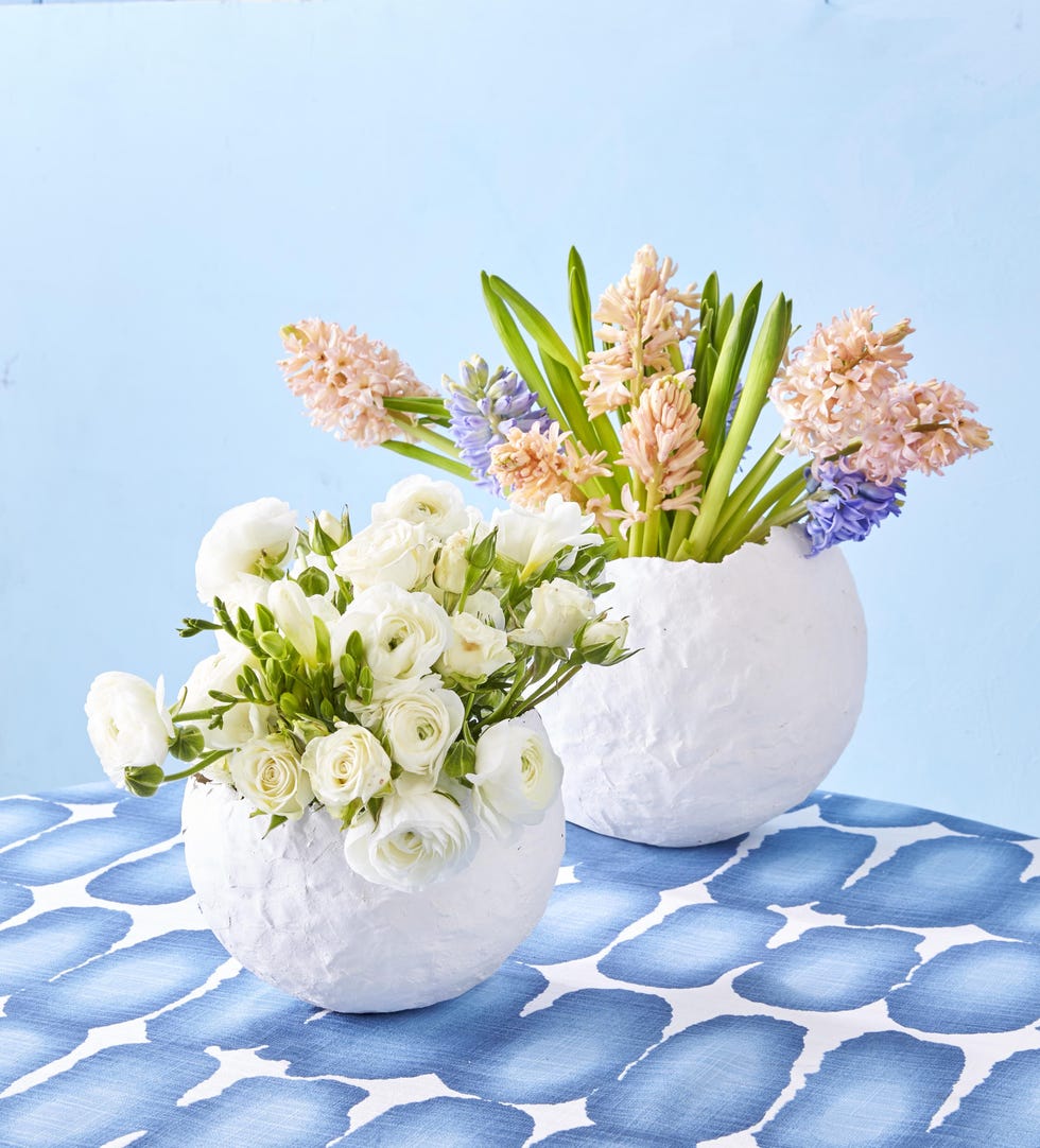 easter egg vases filled with flowers