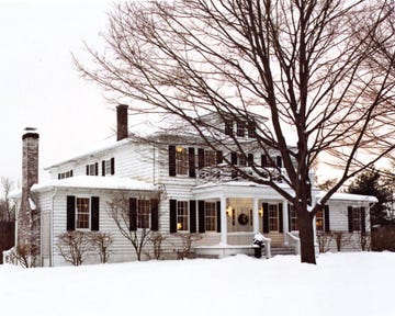 large house with snow outside