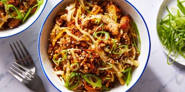 ground pork, cabbage and carrot in a bowl