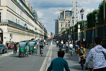 a busy street with people and cars