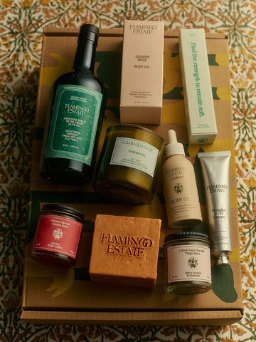 a collection of various skincare and grooming products from flamingo estate on a decorative background