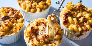 mac and cheese with caramelized onions and thyme in ramekins