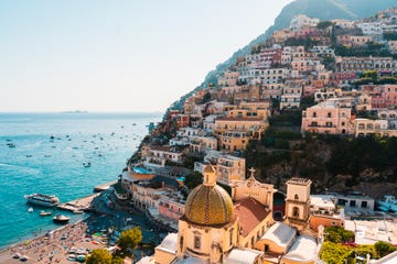 positanos colourful cityscape with leisure and fishing boats on the sea