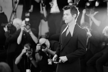 venice, italy   september 05 editors note image has been converted to black and whiteharry styles attends the "don't worry darling" red carpet at the 79th venice international film festival on september 05, 2022 in venice, italy photo by andreas rentzgetty images