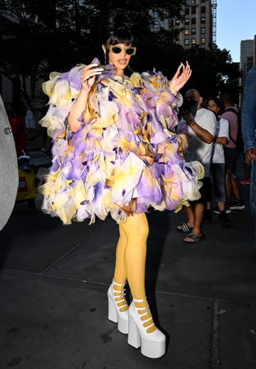 new york, new york july 01 cardi b is seen wearing a marc jacobs sheer ruffled outfit, yellow leggings and white marc jacobs shoes outside the marc jacobs show on july 01, 2024 in new york city photo by daniel zuchnikgetty images