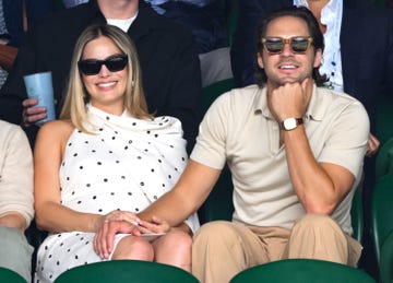 london, england july 12 margot robbie and tom ackerley court side of centre court on day twelve of the wimbledon tennis championships at the all england lawn tennis and croquet club on july 12, 2024 in london, england photo by karwai tangwireimage