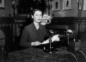 Queen Elizabeth II making her first ever Christmas broadcast to the nation from Sandringham House, Norfolk, 25th December 1952.