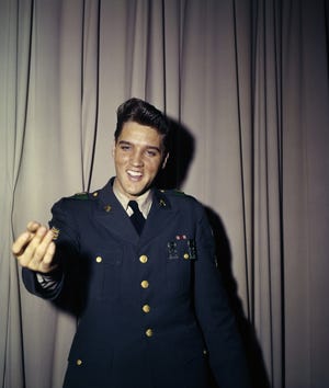 elvis presely in his army uniform