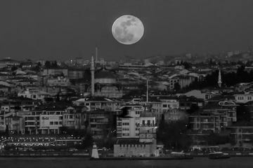 a picture taken on january 31, 2018 shows the moon during a lunar eclipse, referred to as the "super blue blood moon" up in the sky above the bosphorus straits in istanbul skywatchers were hoping for a rare lunar eclipse that combines three unusual events a blue moon, a super moon and a total eclipse which was to make for a large crimson moon viewable in many corners of the globe photo by yasin akgul afp photo credit should read yasin akgulafp via getty images