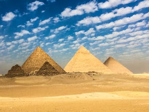 Pyramid, Monument, Landmark, Historic site, Natural environment, Sky, Ecoregion, Desert, Ancient history, Landscape, 