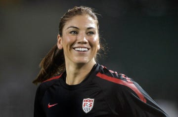 hope solo smiles as she warms up in a game against canada in 2011