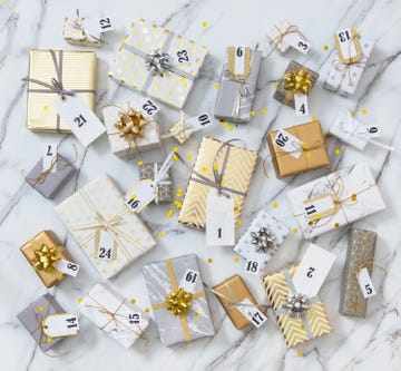 gold and silver wrapped advent gift boxes