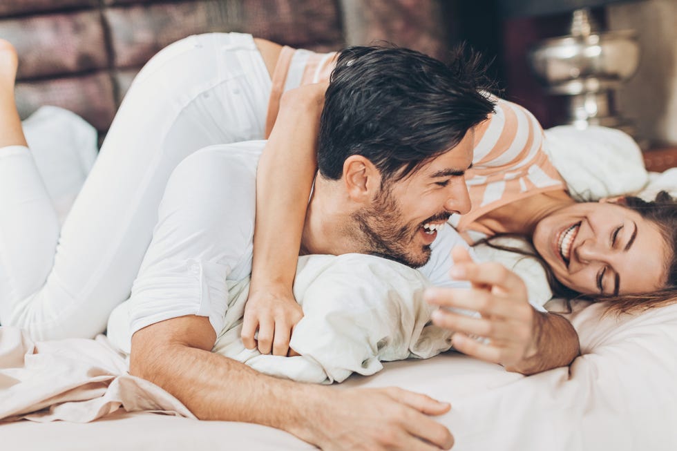 happy couple in love having playful time together