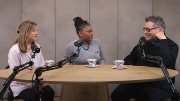 group discussion at a round table with cups