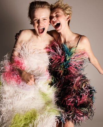 two blonde girls in puffy colorful dresses