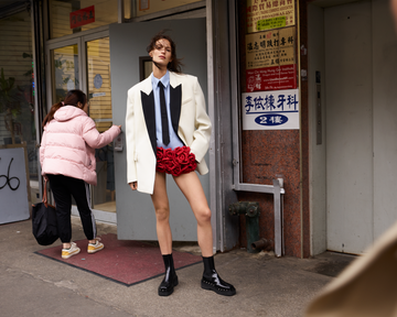 jacket\, shirt\, and skirt\, valentino tie and boots\, valentino garavani stepping out statement outerwear, easy tailoring, and sumptuous layers